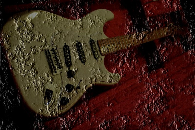Muddy Electric Guitar