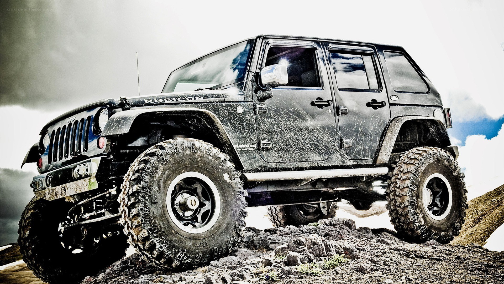 Muddy Jeep Rubicon off-roading