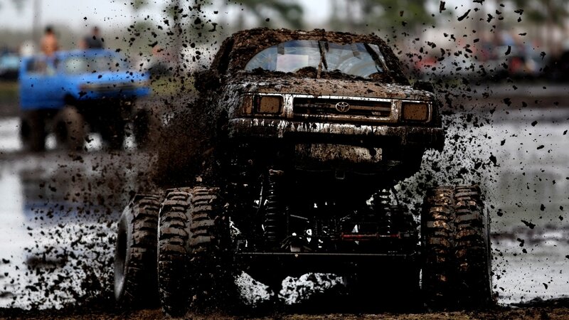 Muddy Monster Truck — Brown, Dramatic, Photograph