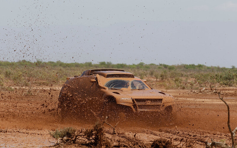 Muddy Off-road Vehicle — Brown, Dynamic