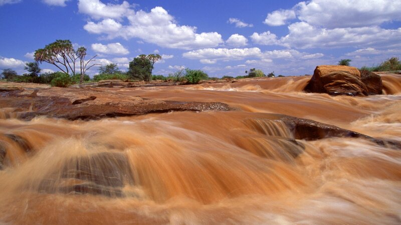 Muddy River Flowing — Blue, Dynamic, Afternoon, Photograph, Rocks