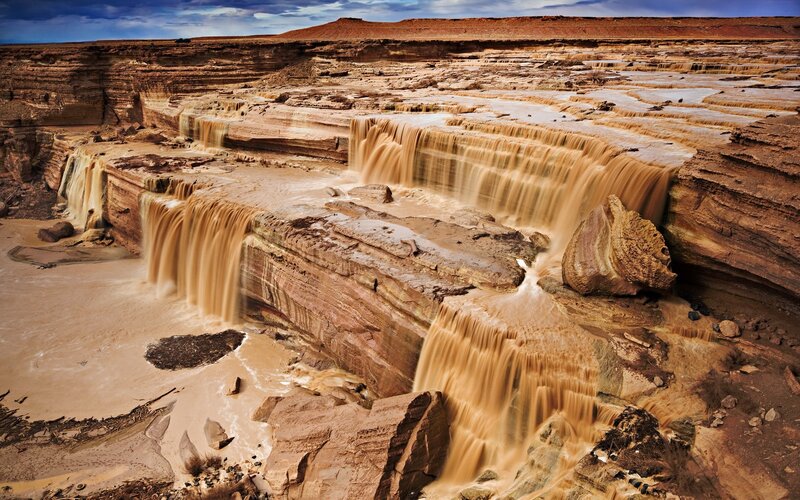 Muddy Waterfall Canyon — Brown, Dramatic, Afternoon