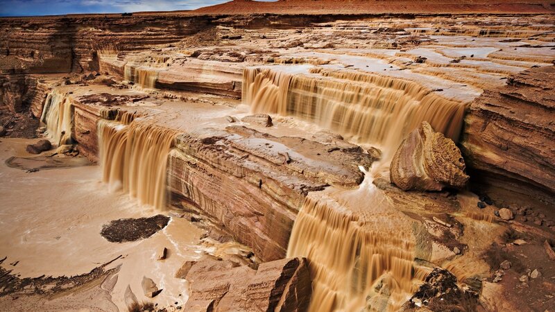Muddy Waterfalls in Canyon — Brown