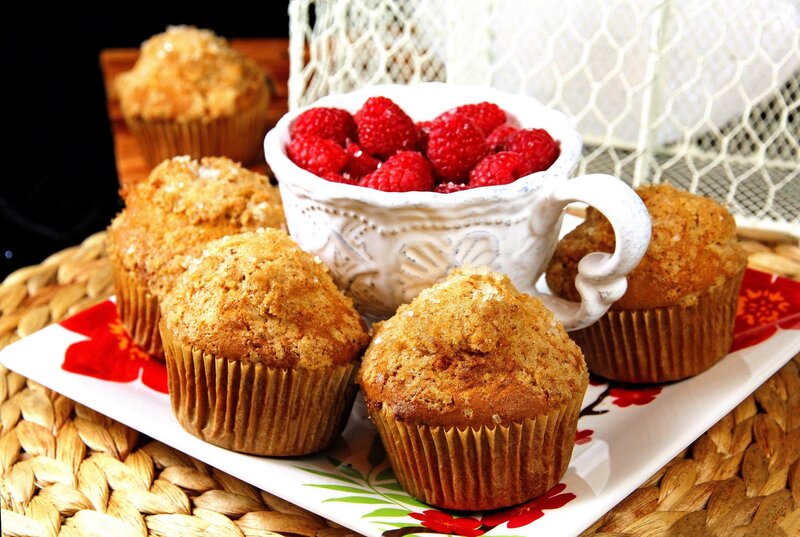Muffins with raspberries on a plate