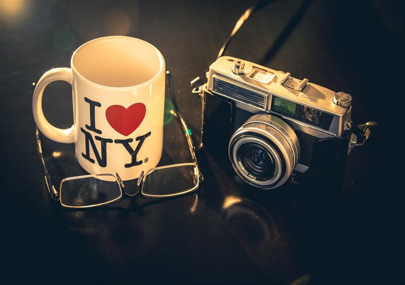 Mug and Camera on Table