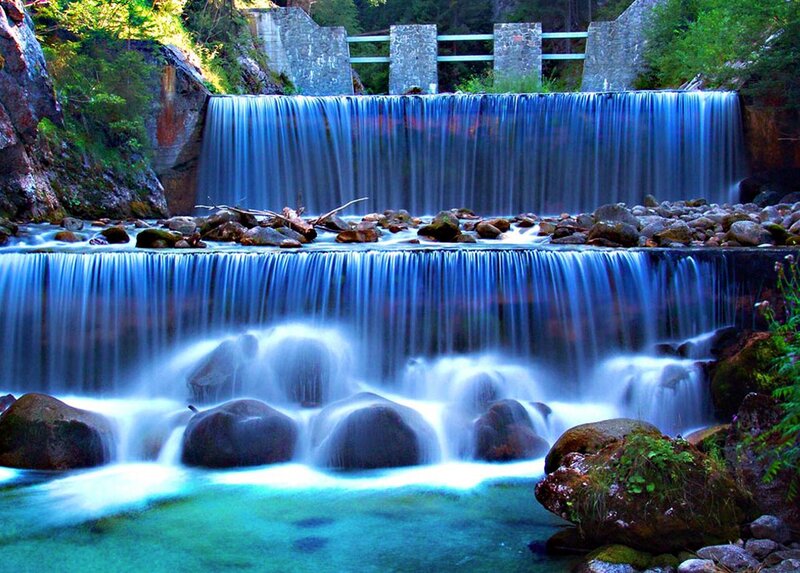 Multi-tiered Waterfall — Blue, Serene, Afternoon, Photograph, Rocks, Trees