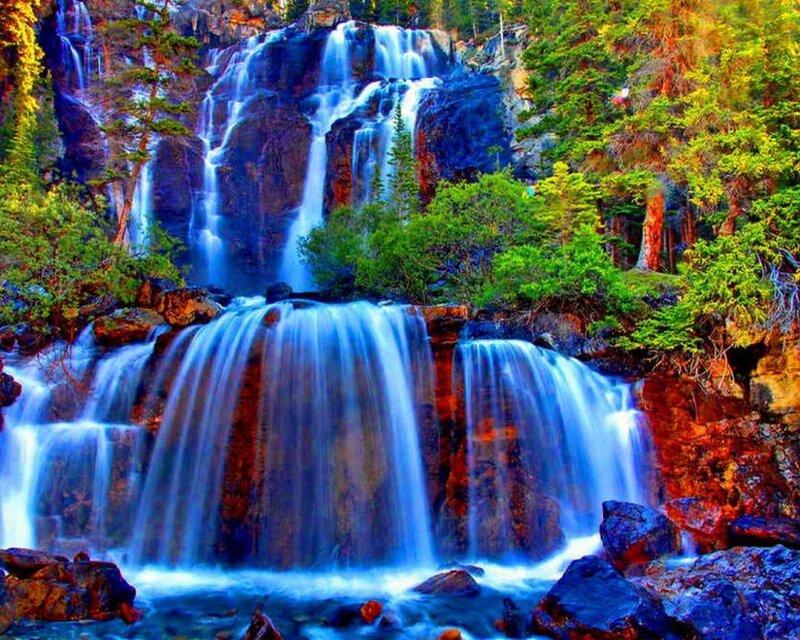 Multi-tiered Waterfall — Blue, Serene, Afternoon, Photograph, Trees, Rocks