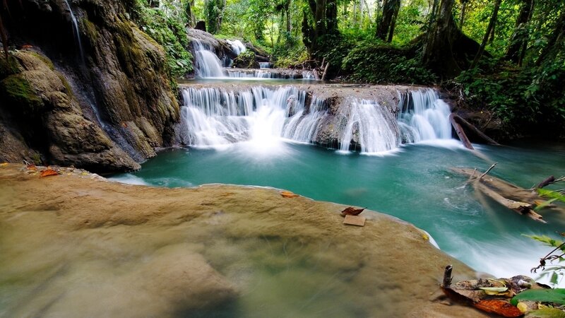 Multi-tiered Waterfall — Green, Serene, Afternoon, Photograph, Forest, River, Rocks, Leaves