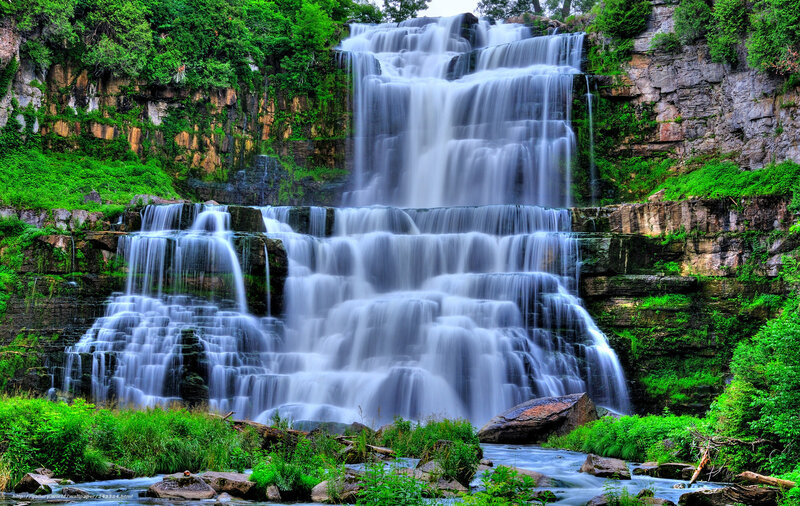 Multi-tiered waterfall in forest