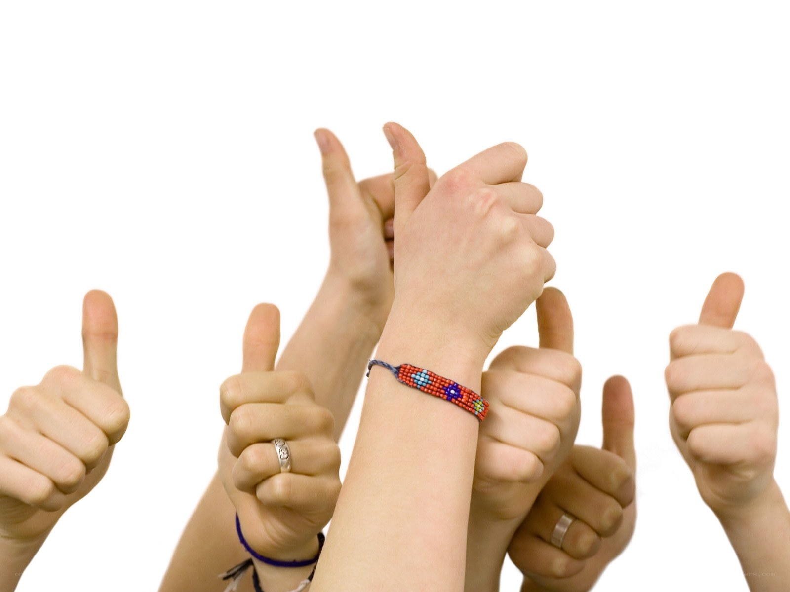 multiple hands giving thumbs up