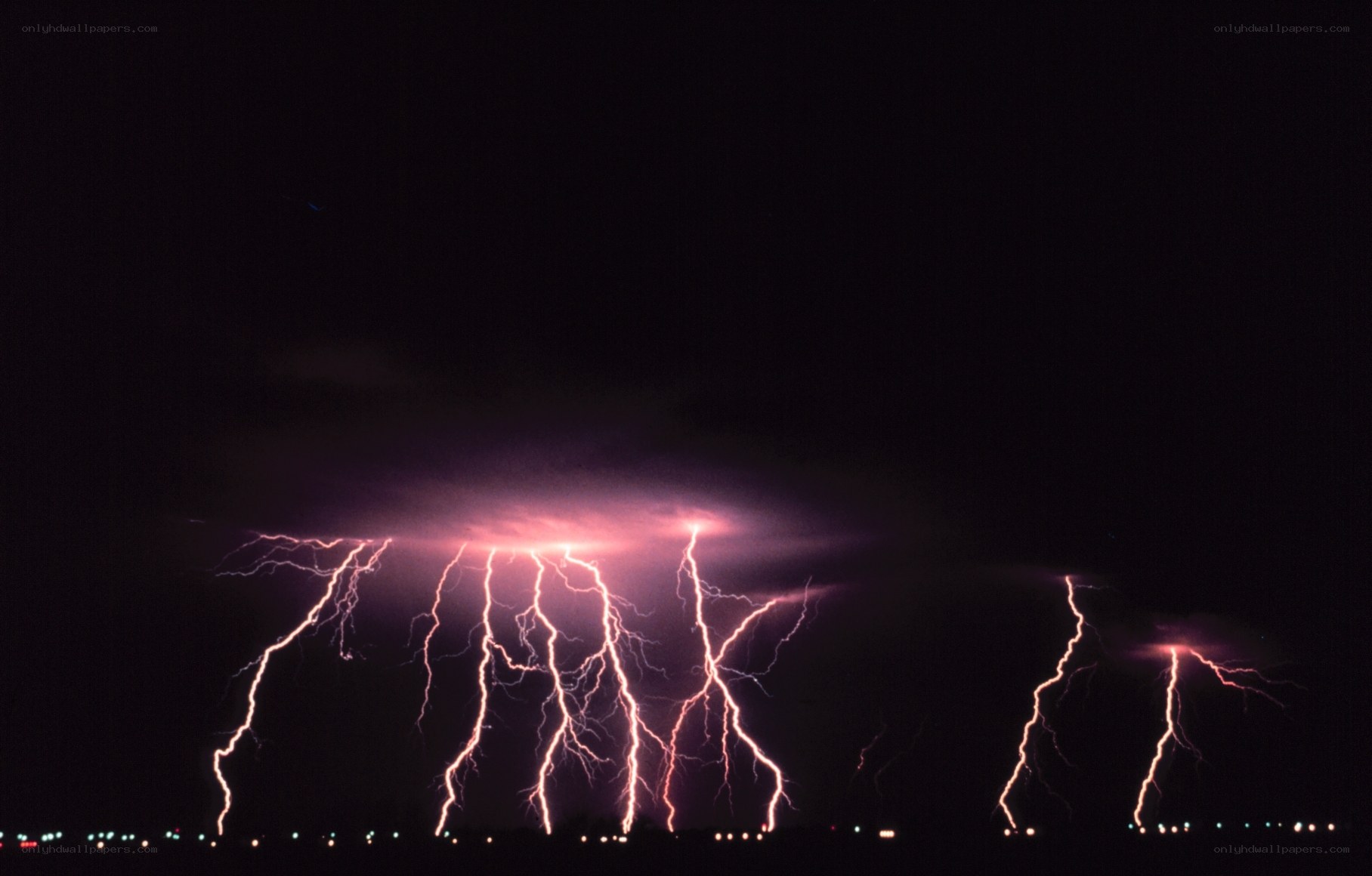 Multiple lightning strikes at night