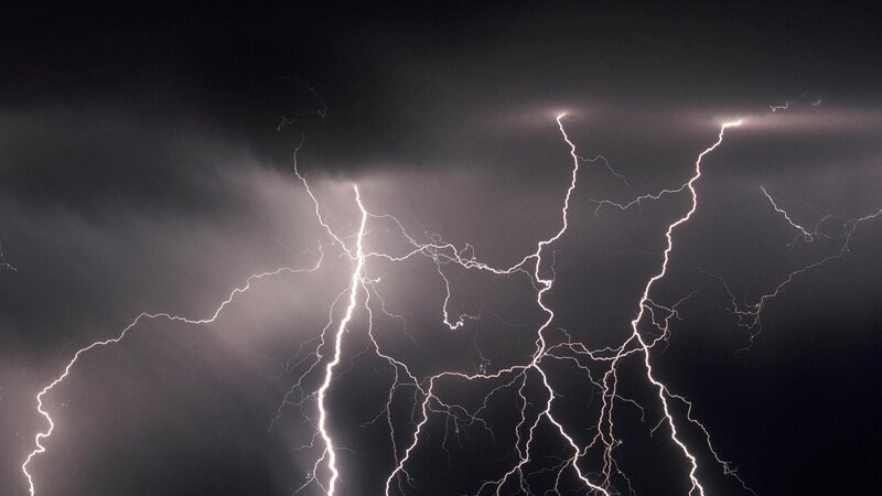 Multiple lightning strikes at night