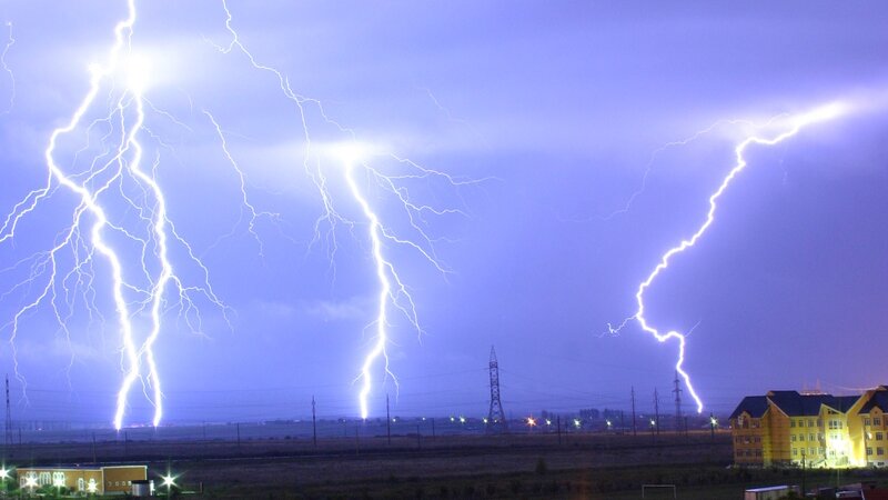 Multiple lightning strikes at night