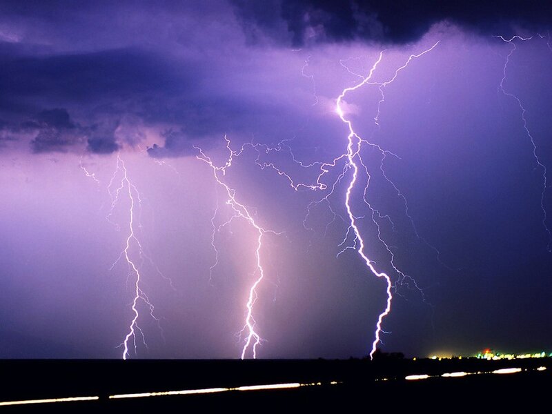 Multiple lightning strikes at night
