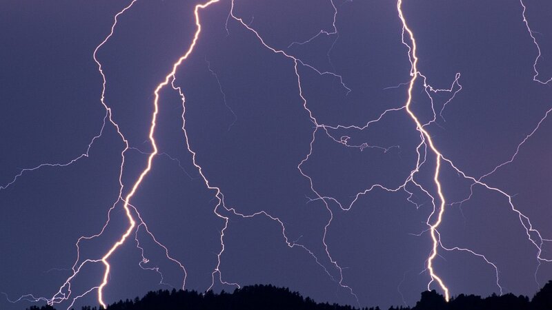 Multiple lightning strikes at night
