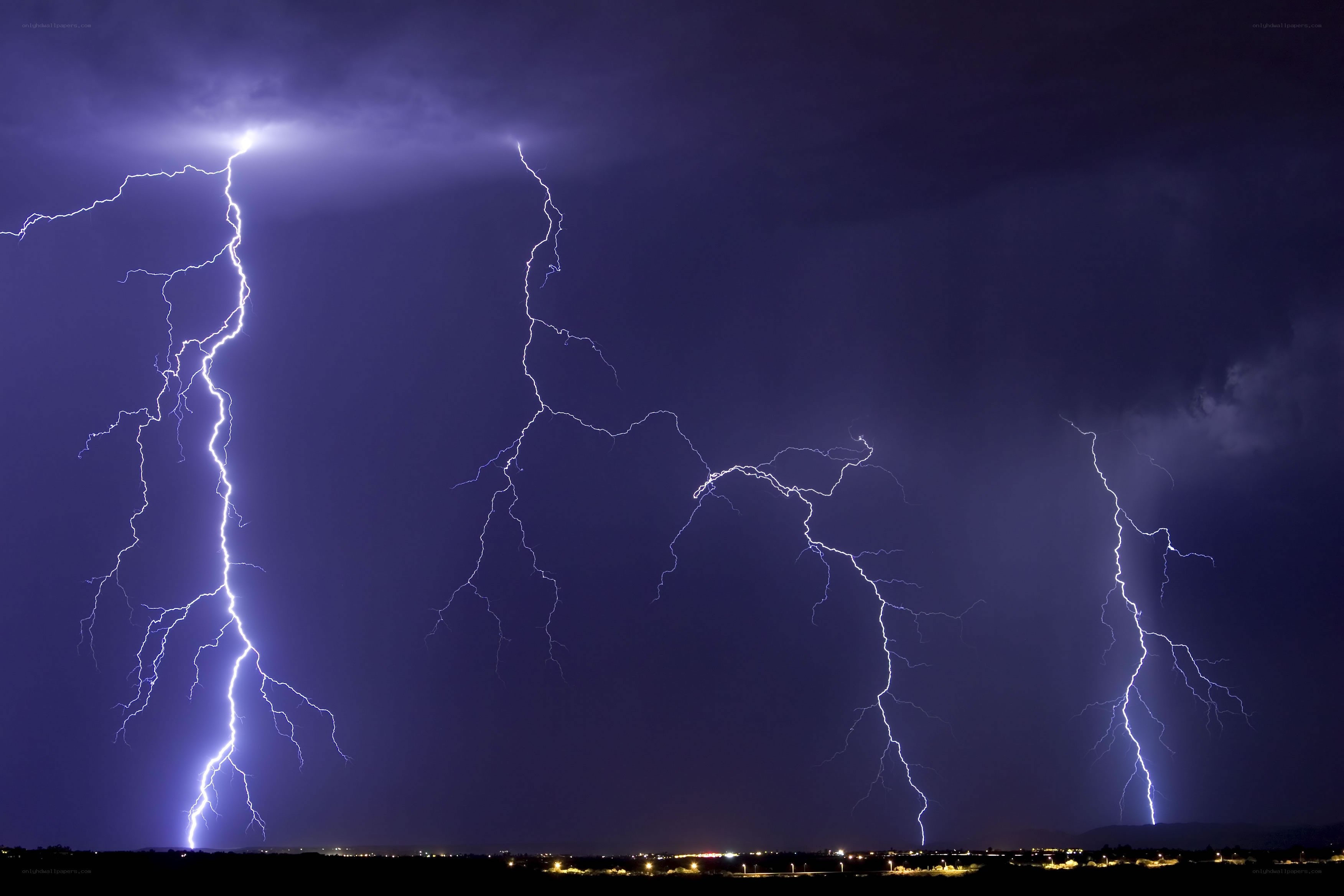 Multiple lightning strikes at night