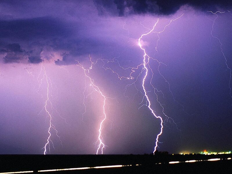 Multiple lightning strikes at night
