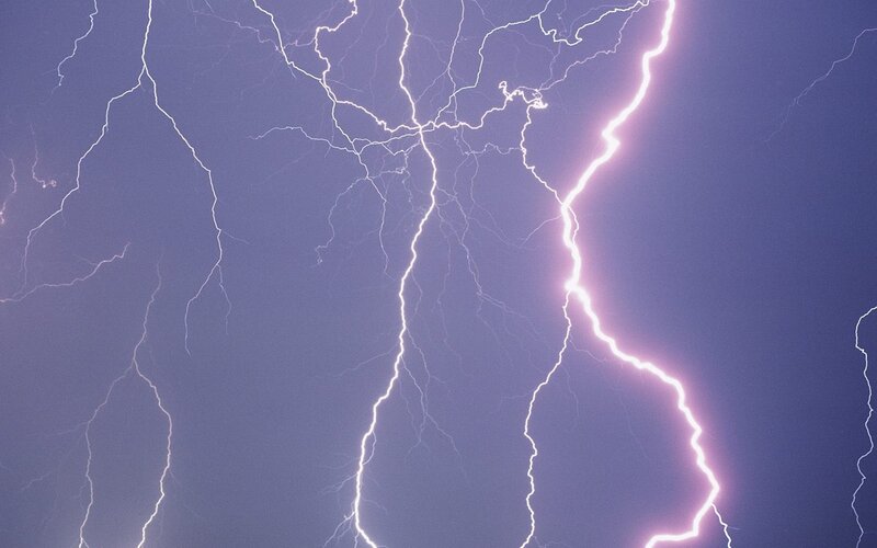 Multiple lightning strikes in the sky