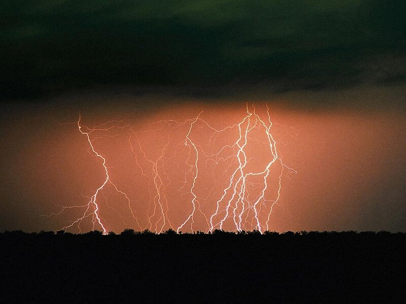 Multiple Lightning Strikes — Orange, Dramatic