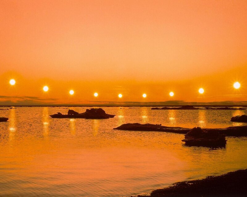Multiple Suns over Water — Orange