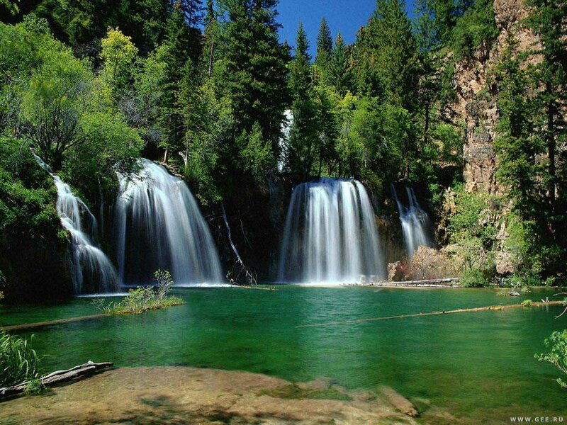 Multiple Waterfalls in Forest — Green, Serene, Afternoon, Photograph, Trees, Pool, Rocks, Sky, Blue
