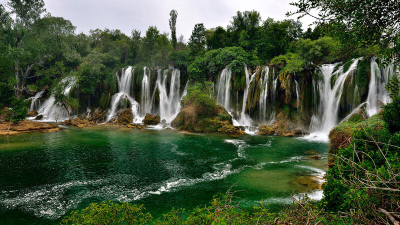 Multiple Waterfalls in Forest — Green, Serene, Afternoon, Photograph, Trees, River, Rocks, Greenery