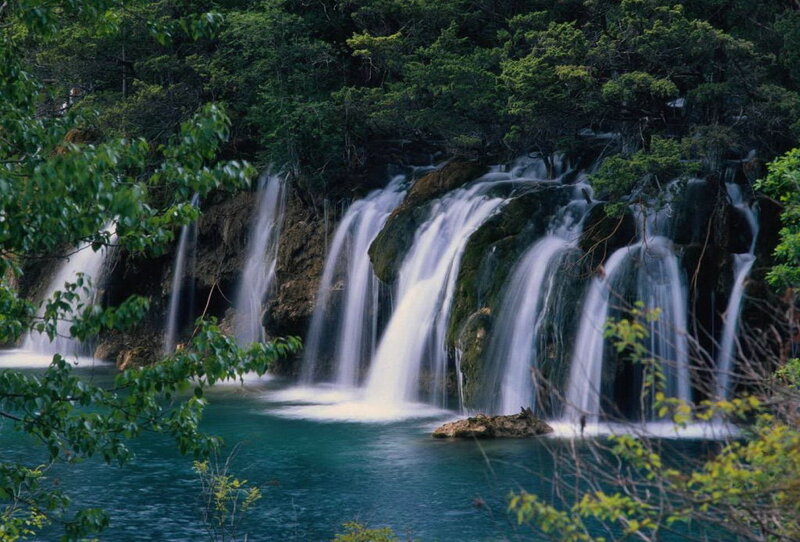 Multiple Waterfalls in Forest — Green, Serene, Afternoon, Photograph, Trees, Rocks, Pool