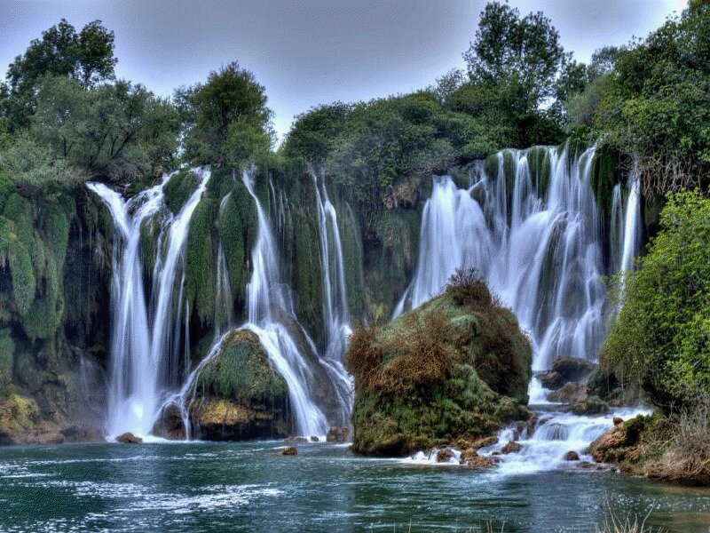 Multiple Waterfalls in Forest — Green, Serene, Photograph