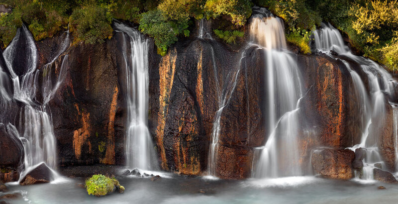 Multiple Waterfalls on Rock — Brown