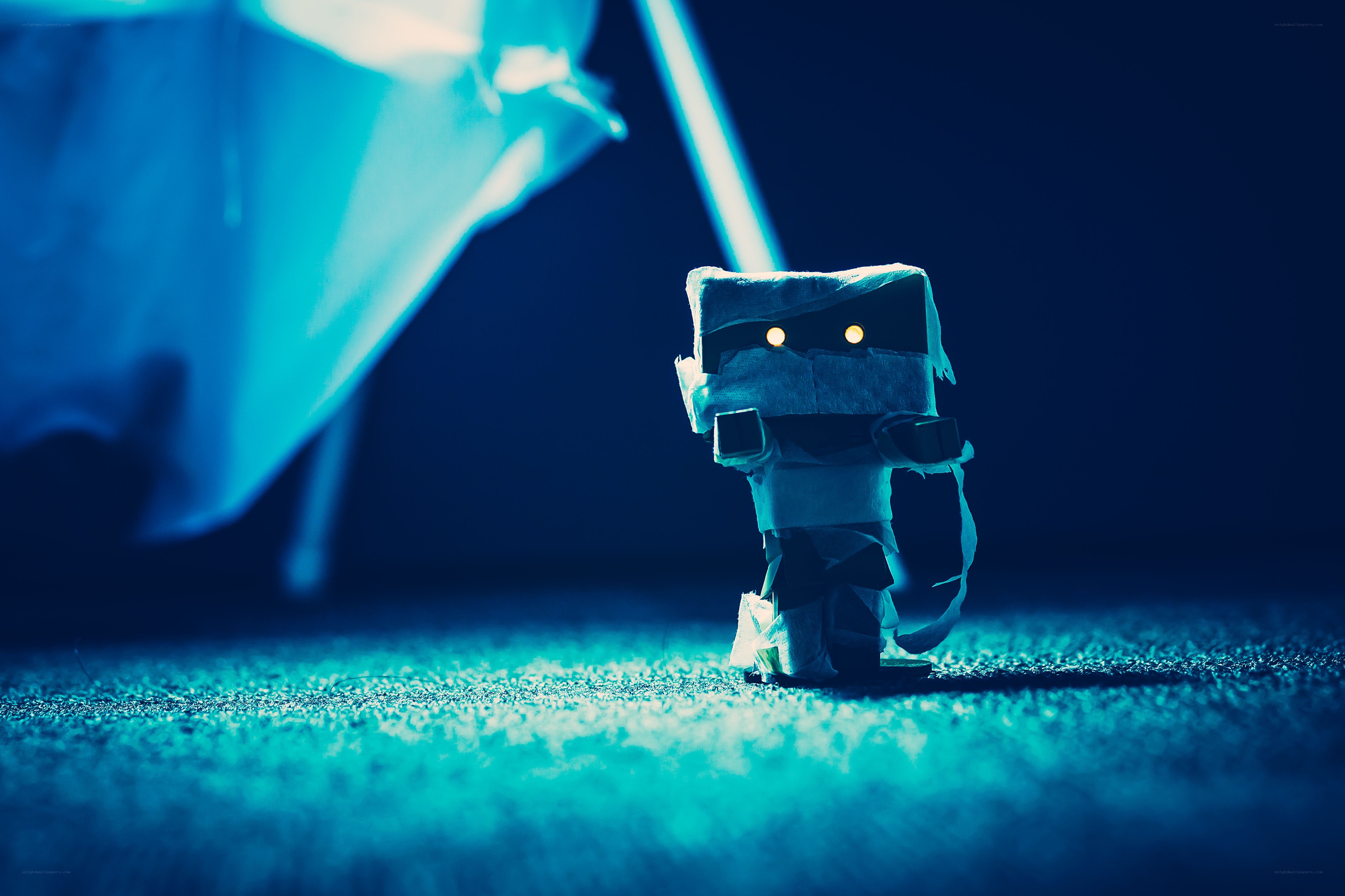 mummy figurine under blue light