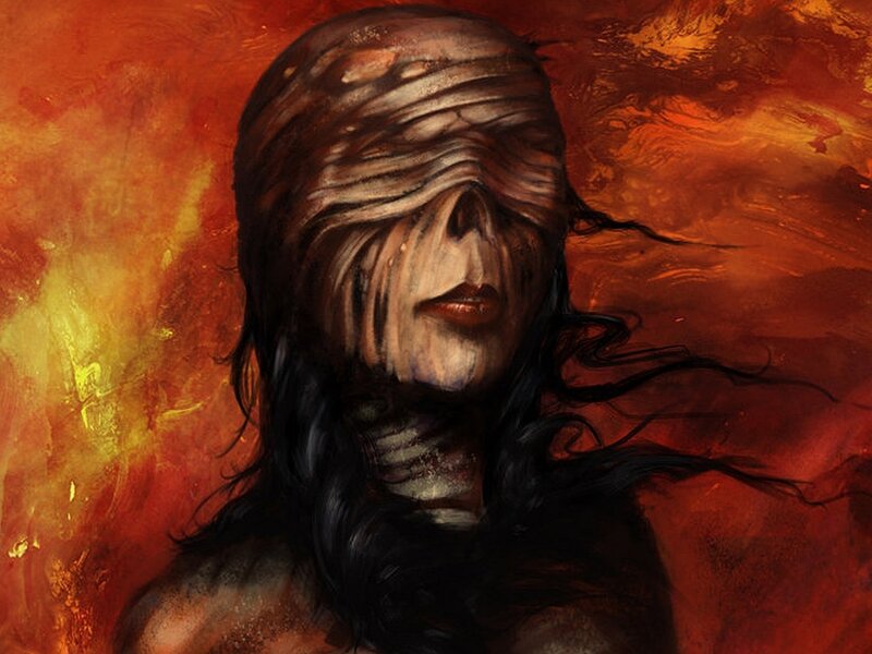 mummy-like figure in fire