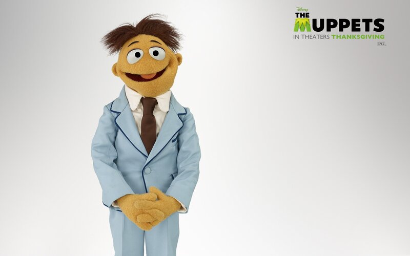 Muppet character in suit