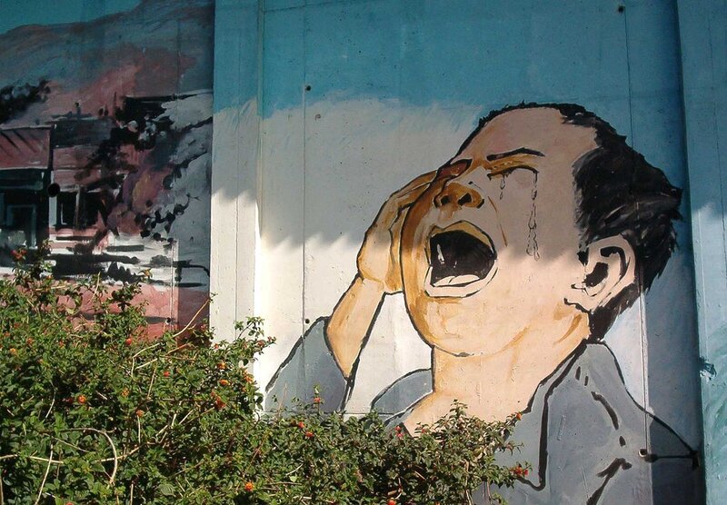 Mural of a crying man