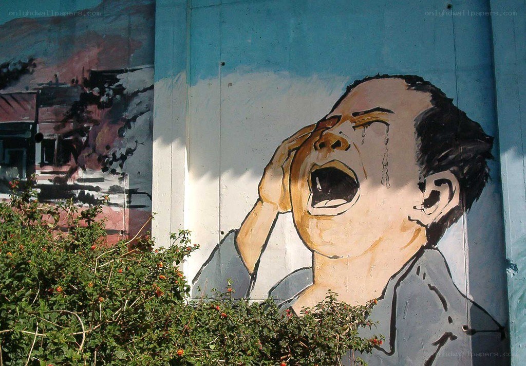 Mural of a crying man