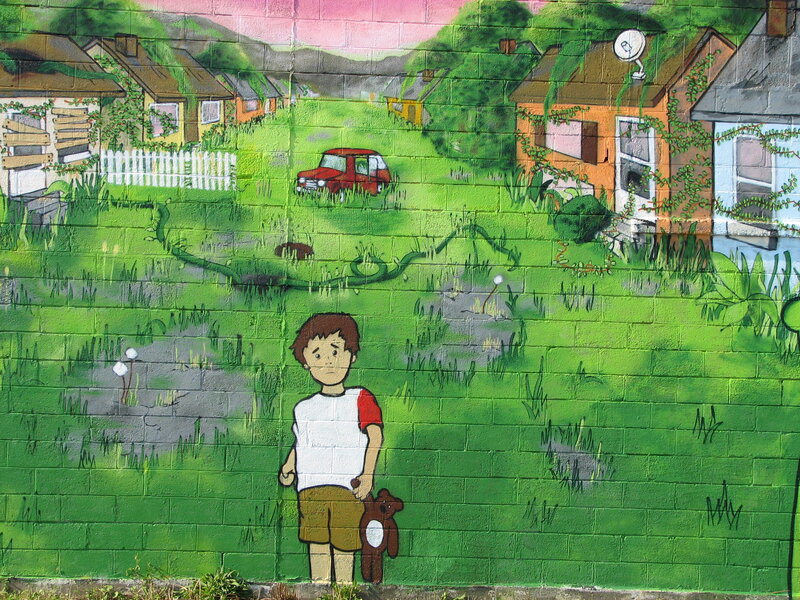 mural of boy with teddy bear