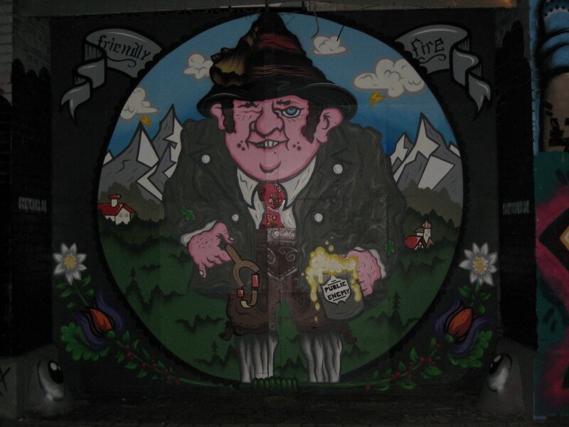 mural of cartoon man with mug