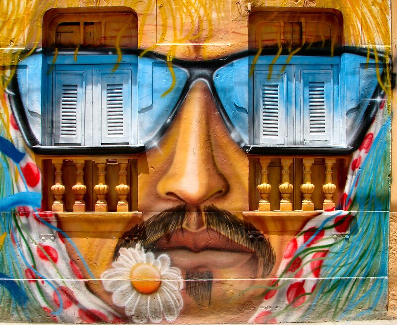 mural of face with sunglasses