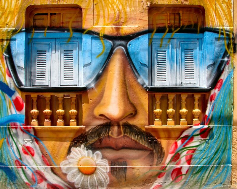 mural of face with sunglasses