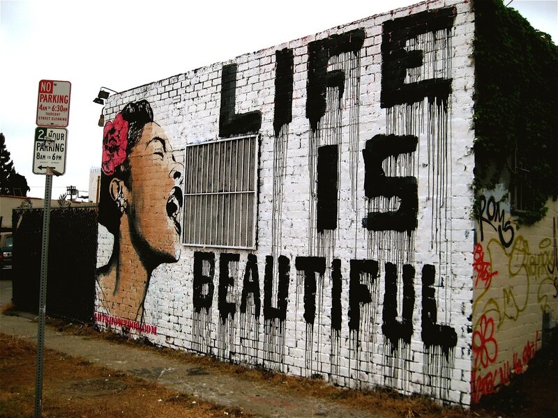 mural with 'life is beautiful' text