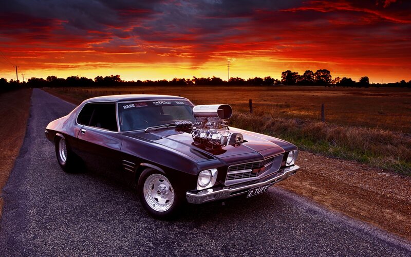 Muscle car at sunset