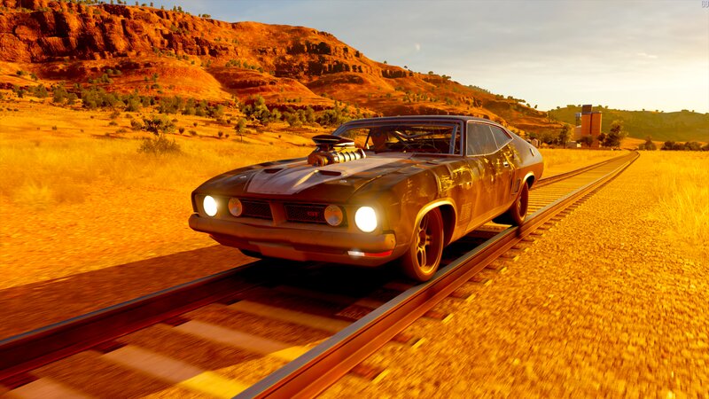 Muscle Car on Train Tracks