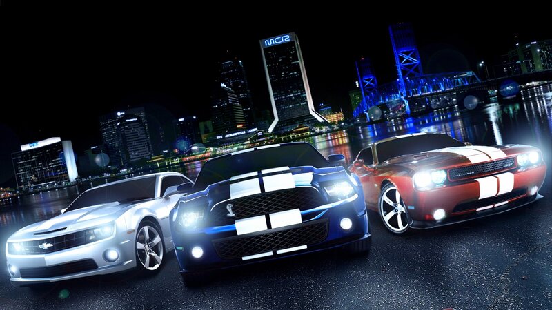 Muscle cars at night in city