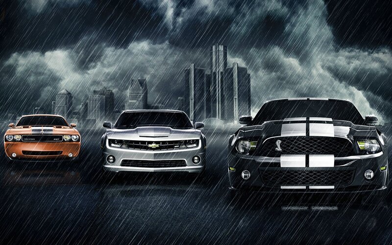Muscle cars in the rain
