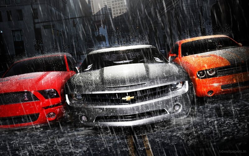 Muscle cars in the rain