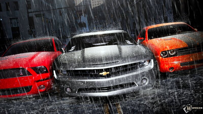 Muscle cars in the rain