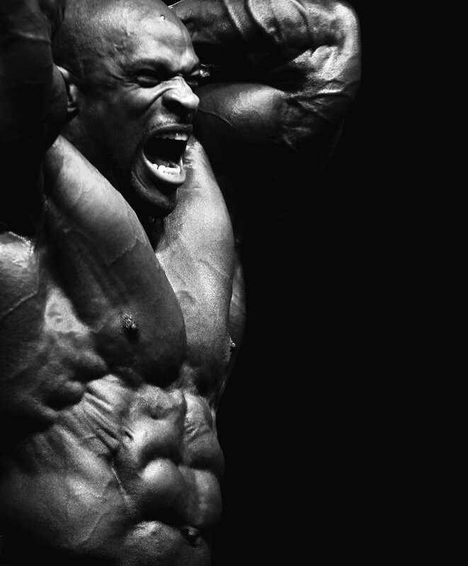 Muscular Man Flexing — Black, Dramatic, Photograph
