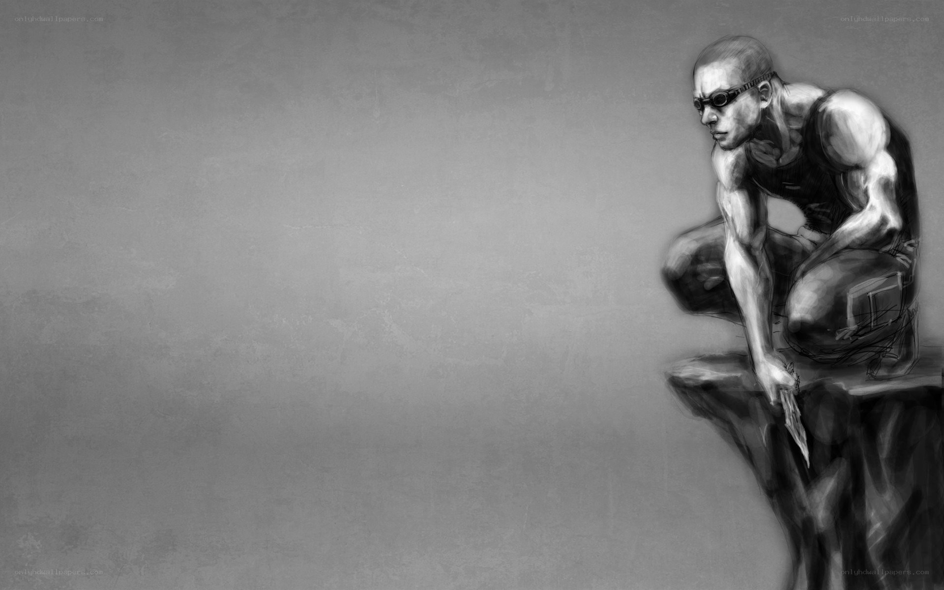 muscular man in crouched pose