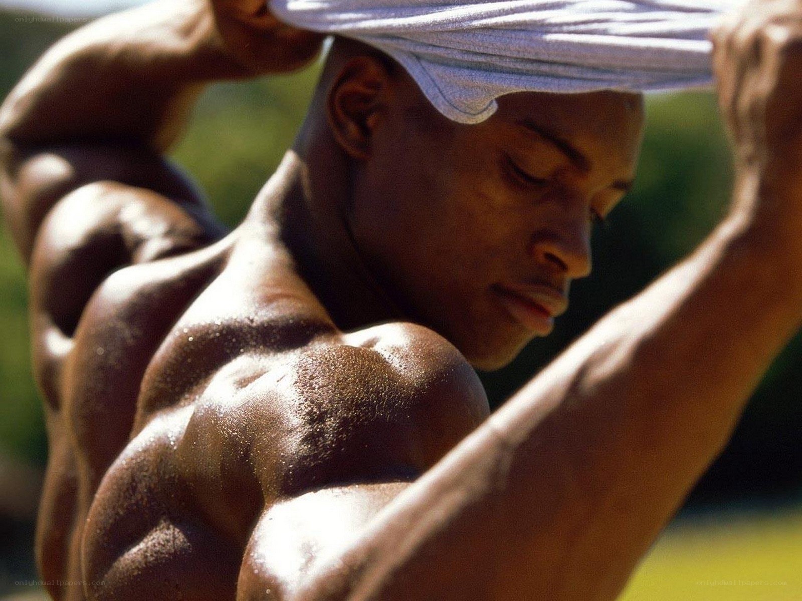 muscular man with towel