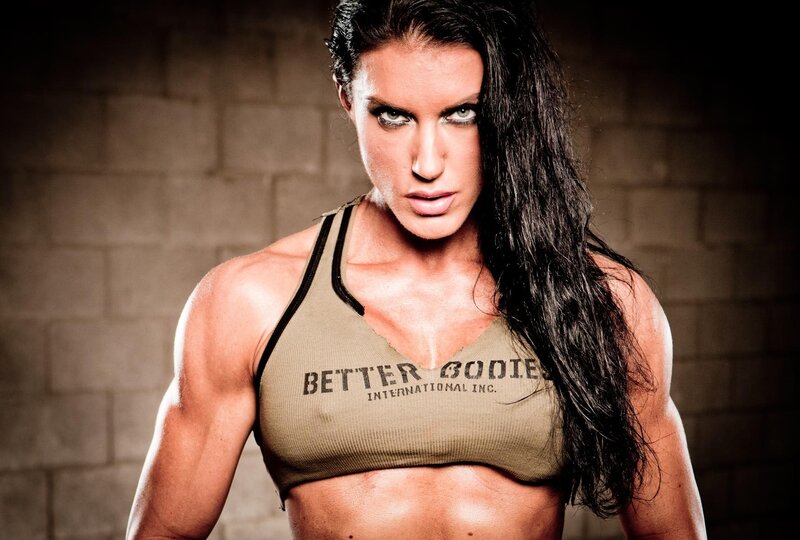 muscular woman in sports bra