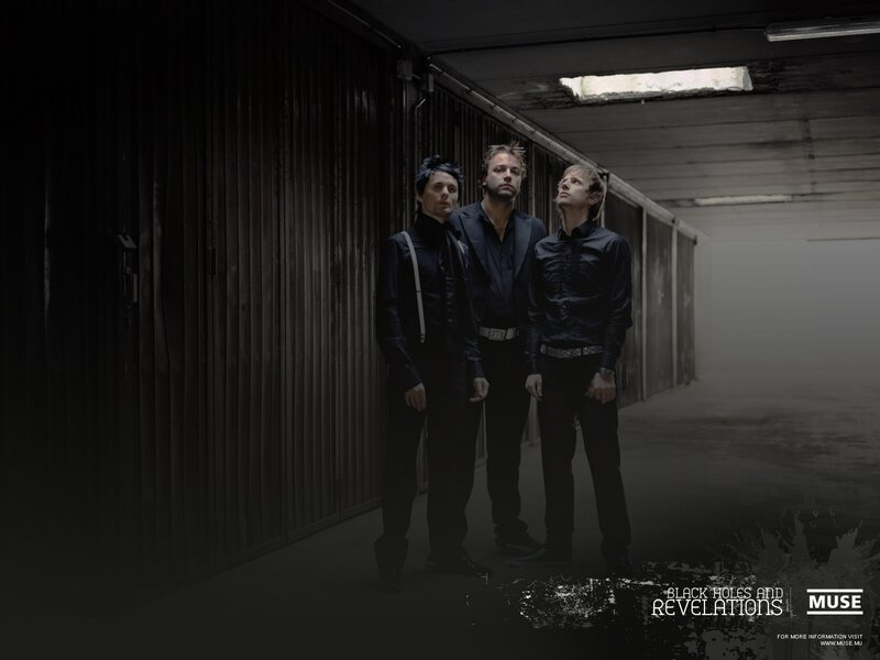 Muse band in a dark corridor